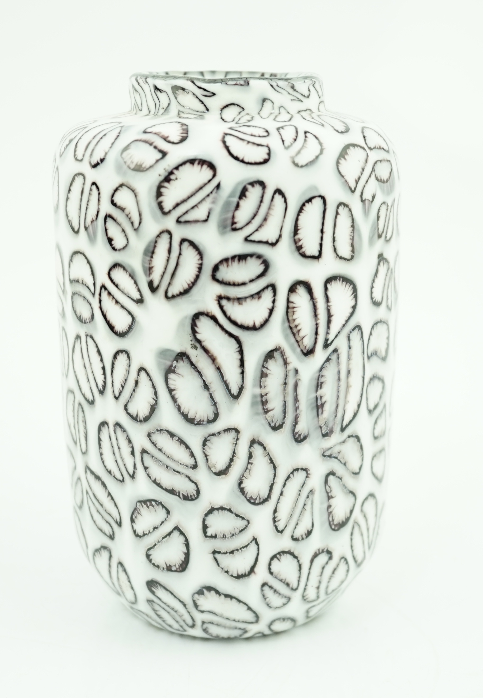 Vittorio Ferro (1932-2012) A Murano glass Murrine vase, with black segments on a white ground, signed, 17cm, Please note this lot attracts an additional import tax of 20% on the hammer price